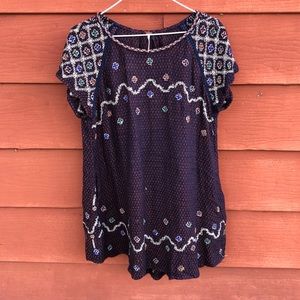 Knit free people tunic / top / blouse. Beaded with lots of detail.
